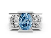 Fancy Blue Oval Cut Diamond Three-Stone Channel Set Ring Set in White gold with Smooth Polished Band