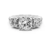 Cushion Cut Diamond Three-Stone Ring Set in White gold with Pavé Band