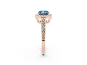 Fancy Blue Cushion Cut Diamond Halo Pavé Engagement Ring Set in Rose gold with Bezel Setting