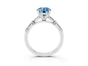 Fancy Blue Round Cut Diamond Solitaire Set in White gold with Side Baguettes and Channel Set Band