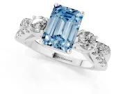 Fancy Blue Emerald Cut Diamond Three-Stone Ring Set in Platinum with Pavé Split Shank and Prong Setting