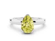 Fancy Yellow Pear Cut Diamond Solitaire Ring Set in Platinum with Prong Head and Smooth Polished Band