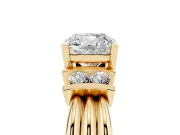 Three-Stone Cushion Cut Diamond Channel Set Ring Set in Yellow gold with Bar Prongs