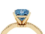 Fancy Blue Princess Cut Diamond Solitaire Ring Set in Yellow gold with Twisted Band and Bead Prong Setting