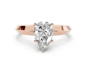 Pear Cut Diamond Solitaire Engagement Ring Set in Rose gold with Flat Band and Prong Setting