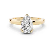 Pear Cut Diamond Solitaire Ring Set in Yellow gold with Prong Head and Smooth Polished Band