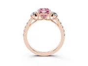 Fancy Pink Cushion Cut Diamond Three-Stone Ring Set in Rose gold with Round Side Stones and Delicate Pavé Band