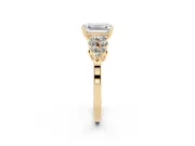 Emerald Cut Diamond Cluster Engagement Ring Set in Yellow gold with Pavé Band and Prong Setting