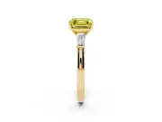 Fancy Yellow Asscher Cut Diamond Solitaire Ring Set in Yellow gold with Tapered Baguette Side Stones and Prong Setting