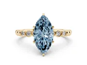 Fancy Blue Marquise Cut Diamond Solitaire Engagement Ring Set in Yellow gold with Bezel Accents on Beaded Band
