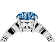 Fancy Blue Round Cut Diamond Solitaire Ring Set in Platinum with Infinity Twist Pavé Band