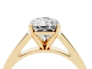 Radiant Cut Diamond Solitaire Engagement Ring Set in Yellow gold with Prong Setting and Tapered Band