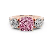 Fancy Pink Cushion Cut Diamond Three-Stone Ring Set in Rose gold with Pavé Band