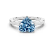 Fancy Blue Heart Cut Diamond Solitaire Ring Set in Platinum with Prong Setting and Classic Band