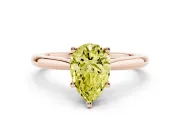 Fancy Yellow Pear Cut Diamond Solitaire Ring Set in Rose gold with Cathedral Band and Prong Setting