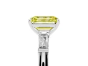 Fancy Yellow Emerald Cut Diamond Solitaire Ring Set in Silver with Tapered Baguette Side Stones and Prong Setting