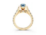 Fancy Blue Emerald Cut Diamond Classic Solitaire Ring Set in Yellow gold with Pavé Band and Prong Setting