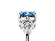 Fancy Blue Asscher Cut Diamond Solitaire Ring Set in White gold with Cluster Accents on Each Side