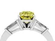 Fancy Yellow Emerald Cut Diamond Solitaire Ring Set in Silver with Tapered Baguette Accents and Prong Setting