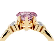 Fancy Pink Three-Stone Heart Cut Diamond Channel Set Ring Set in Yellow gold with Bar Prongs