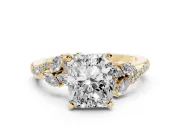 Radiant Cut Diamond Solitaire Ring Set in Yellow gold with Marquise Twist Band and Prong Setting
