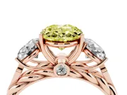 Fancy Yellow Oval Cut Diamond Three-Stone Ring Set in Rose gold with Braided Band
