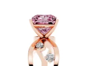 Fancy Pink Princess Cut Diamond Solitaire Ring Set in Rose gold with Side Stones on Criss-Cross Band and Prong Setting