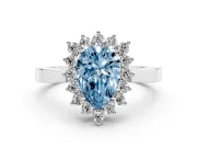 Fancy Blue Pear Cut Diamond Halo Ring Set in White gold with Round Halo and Smooth Solitaire Band