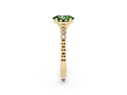 Fancy Green Oval Cut Diamond Solitaire Engagement Ring Set in Yellow gold with Bezel Accents on Beaded Band