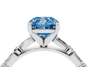 Fancy Blue Cushion Cut Diamond Solitaire Set in Platinum with Side Baguettes and Channel Set Band