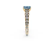 Fancy Blue Emerald Cut Diamond Classic Solitaire Ring Set in Yellow gold with Pavé Band and Prong Setting