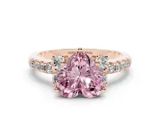 Heart-Shaped Side Stone Engagement Ring Setting for a Fancy Pink Lab-Grown Diamond | Pave Band | Rose Gold