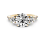 Round Cut Diamond Three-Stone Ring Set in Yellow gold with Pavé Band and Graduated Sides
