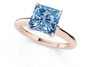 Fancy Blue Princess Cut Diamond Solitaire Ring Set in Rose gold with Cathedral Band and Prong Setting
