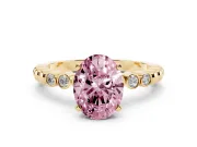 Fancy Pink Oval Cut Diamond Solitaire Engagement Ring Set in Yellow gold with Bezel Accents on Beaded Band