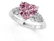 Fancy Pink Three-Stone Heart Cut Diamond Ring Set in White gold with Pear Side Stones and Prong Setting