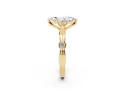 Marquise Cut Diamond Solitaire Twisted Band Ring Set in Yellow gold with Accent Stones and Prong Setting