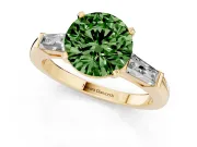 Fancy Green Round Cut Diamond Solitaire Ring Set in Yellow gold with Tapered Baguette Side Stones and Prong Setting