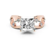 Princess Cut Diamond Solitaire Ring Set in Rose gold with Side Stones on Criss-Cross Band and Prong Setting