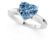 Fancy Blue Heart Cut Diamond Solitaire Ring Set in Platinum with Prong Setting and Classic Band