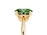 Fancy Green Oval Cut Diamond Solitaire Ring Set in Yellow gold with Prong Setting on a Plain Round Band