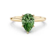 Fancy Green Pear Cut Diamond Solitaire Ring Set in Yellow gold with Cathedral Band and Prong Setting