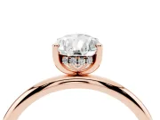 Pear Cut Diamond Solitaire Engagement Ring Set in Rose gold with Prong Setting and Polished Band