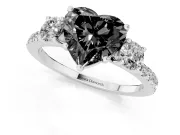 Fancy Black Heart Cut Diamond Three-Stone Ring Set in Platinum with Pavé Band and Graduated Sides