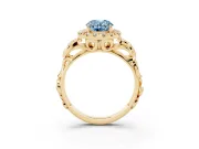 Fancy Blue Oval Cut Diamond Halo Ring Set in Yellow gold with Scrollwork Band and Prong Setting