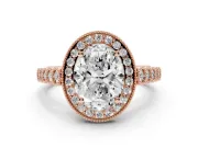 Oval Cut Diamond Milgrain Halo Solitaire Ring Set in Rose gold with Bezel Set Side Stones and Pavé Band
