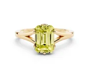Fancy Yellow Emerald Cut Diamond Solitaire Ring Set in Yellow gold with Polished Tapered Band and Prong Setting