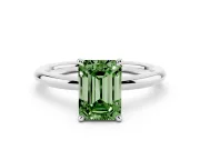 Fancy Green Emerald Cut Diamond Solitaire Ring Set in Silver with Thin Band and Prong Setting