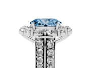 Fancy Blue Oval Cut Diamond Halo Engagement Ring Set in White gold with Split Shank and Prong Setting