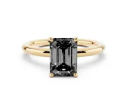 Fancy Black Emerald Cut Diamond Solitaire Ring Set in Yellow gold with Thin Band and Prong Setting